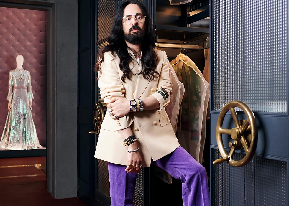 Alessandro Michele new creative director of Valentino standing in front of a vault