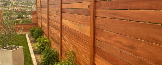 Tigerwood Hardwood Horizontal Fence with Stain in San Clemente, CA