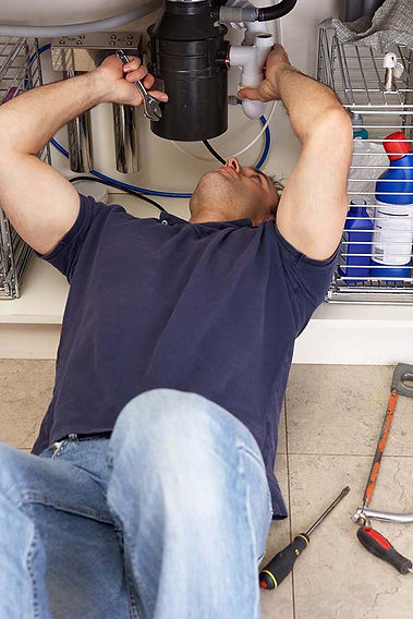 working on garbage disposal.jpg