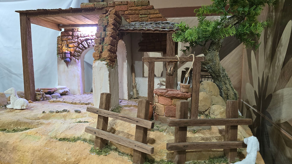 escena completa de belén casa con pozo y árbol 3 ambientes
