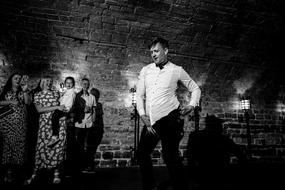 groom dancing at cardiff castle wedding