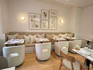 Modern hotel bedroom renovation with contemporary design and comfortable furnishings.