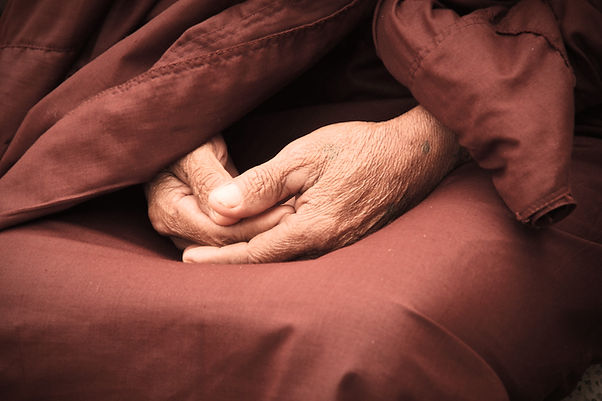 buddhist monk meditating lotus pose dhyana mudra spiritual yoga practice purpose of meditation