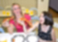 Girls eating pizza at birthday party