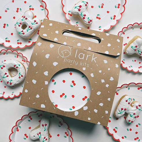 Donuts designed to match party kit designs with cherries