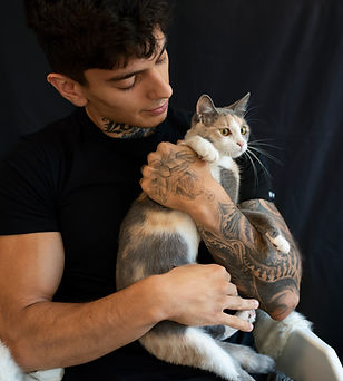 medium-shot-man-holding-cute-cat.jpg