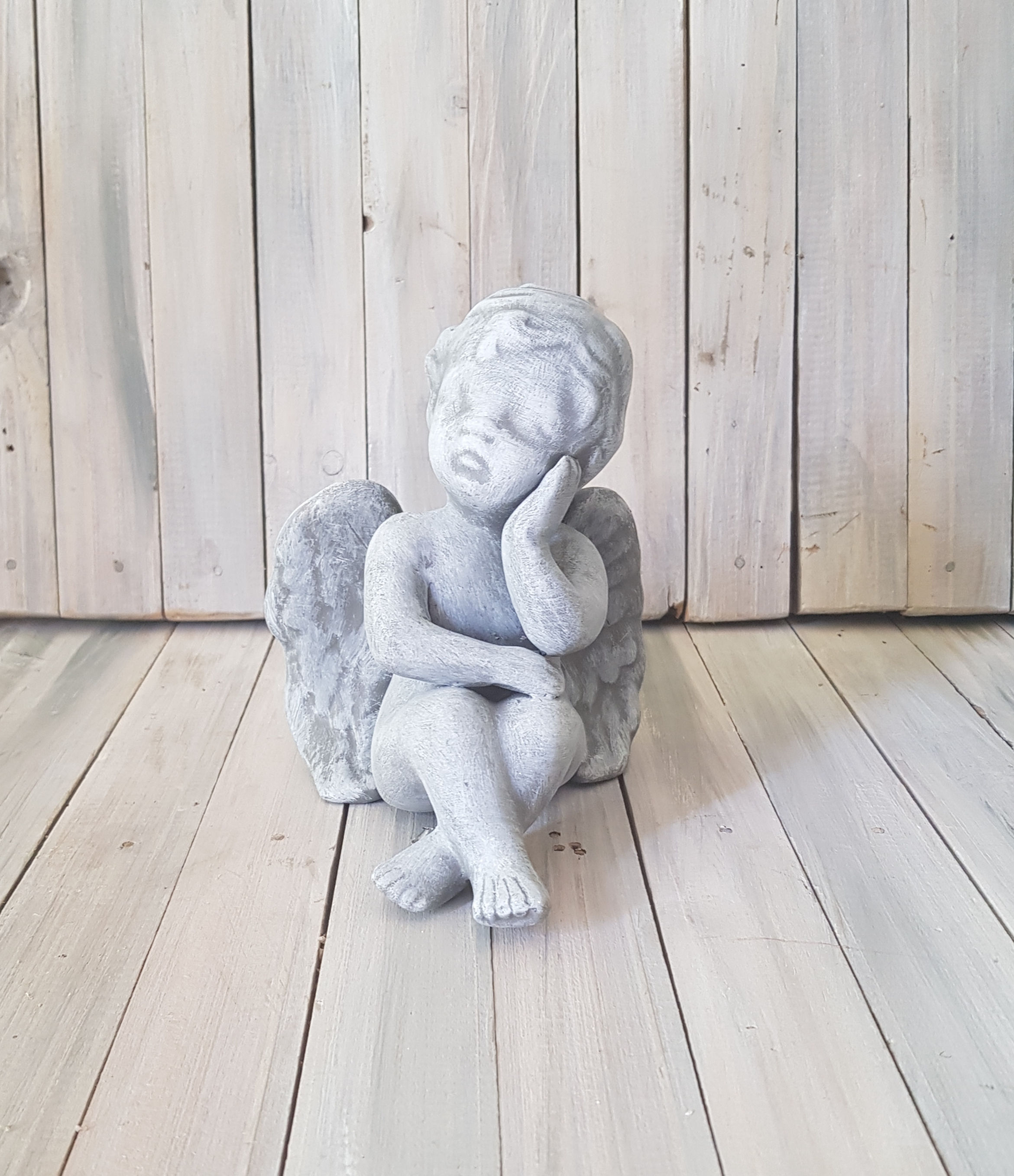 Medium Thinking Angel