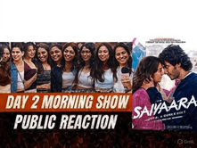 Women at a theater give reactions with smiles; bold text reads "Day 2 Morning Show Public Reaction." A movie couple gazes tenderly.