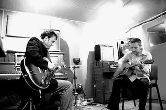 Recording guitar at the studio