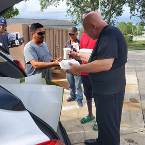 Distributing Meals at Gas Station