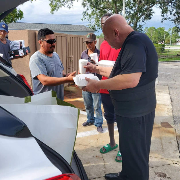 Distributing Meals at Gas Station