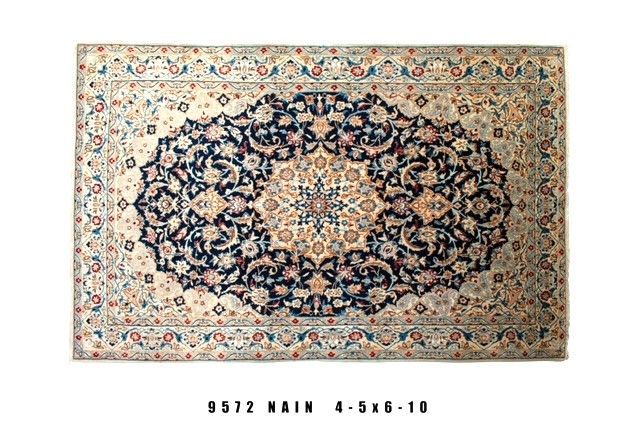 Top view of the 50 years old Nain Rug with Dark Blue and Dark Beige Colors