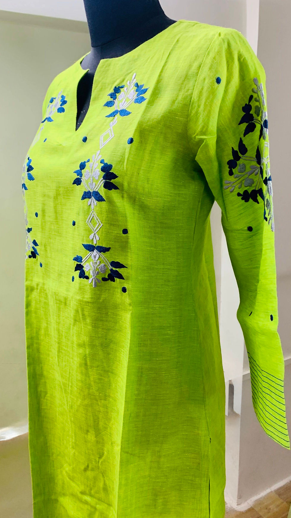 Light green embroidered linen kurta with a relaxed fit by Azitiz