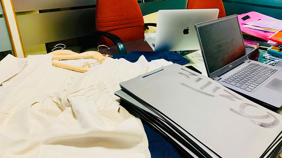 Close-up view of folded pure linen shirts stacked neatly