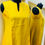Thumbnail: Alternate side view of Azitiz sleeveless linen tunic showing armhole detail and knee-length cut