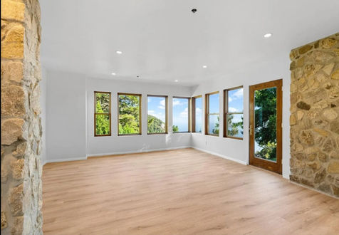 living room stone accent wall remodel
