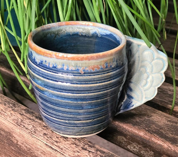 espressokopje met bloemenhandvat