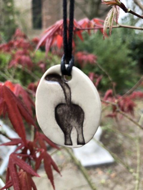Thumbnail: cat butt pendant necklace