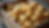 Close-up view of fresh surplus potatoes in a wooden crate