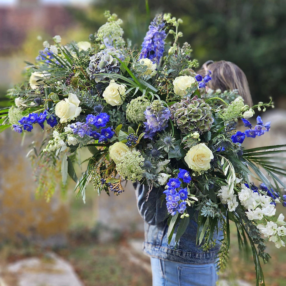 Blue and White casket spray