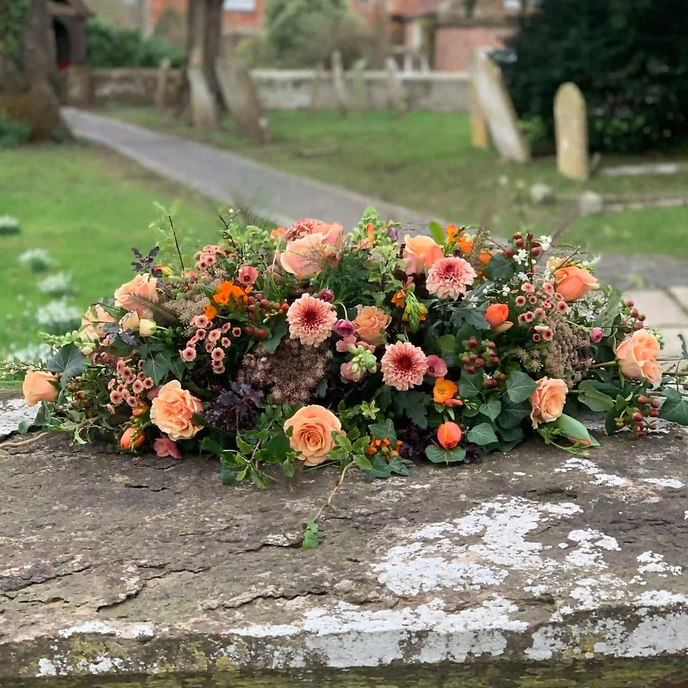Autumn sunset casket spray