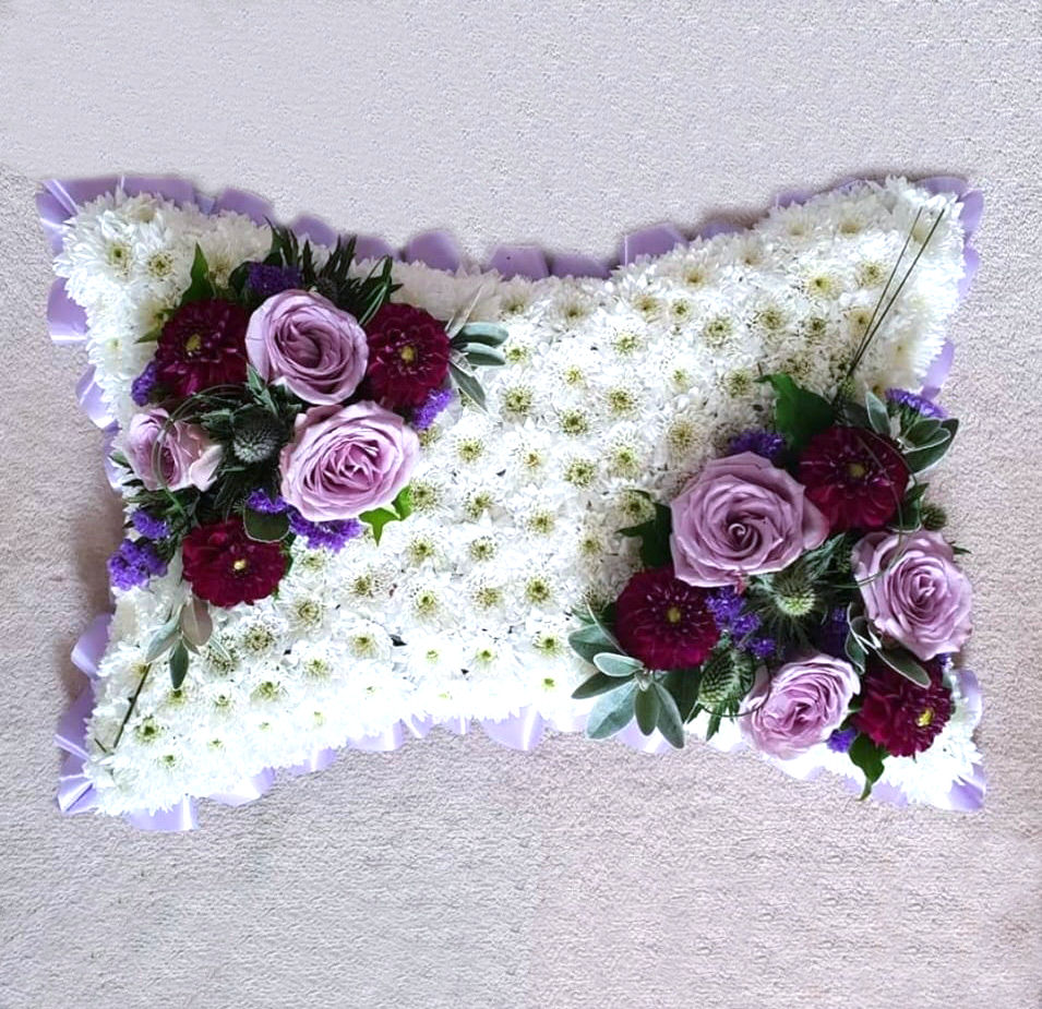 Ribbon edged based pillows