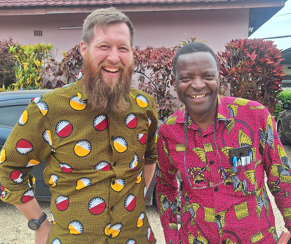 Isaac with Mr. Tembo, the Dean of Students at ACU