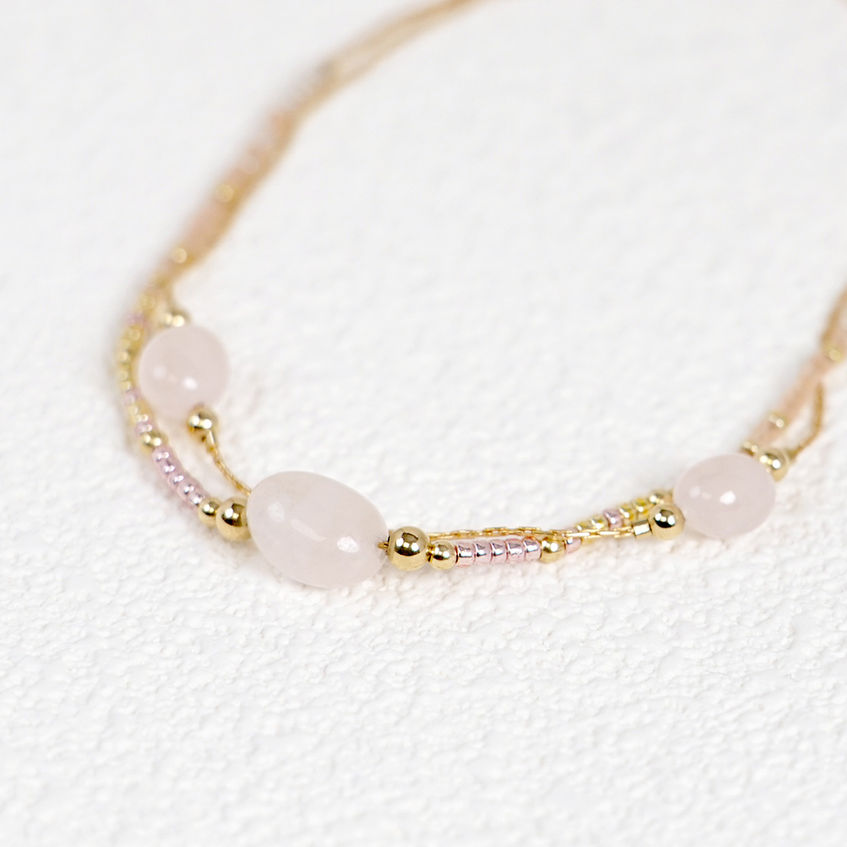 Loxi Bracelet Duet flatlay on textured paper