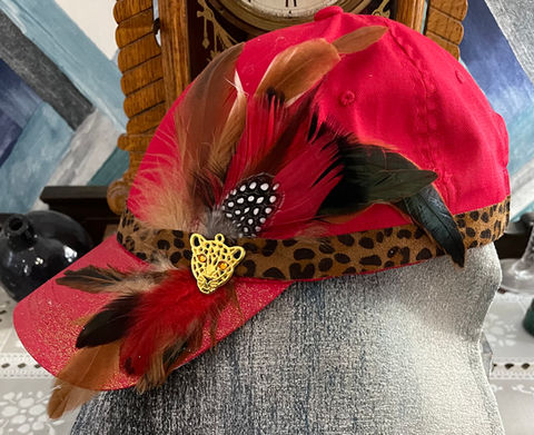 Red with cheeta print an  animal pin and feathers
