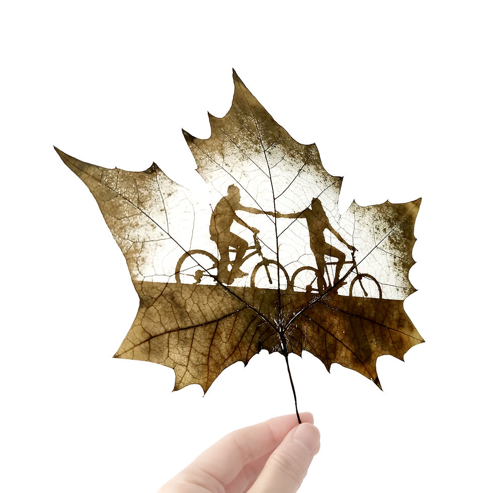 Thumbnail: Bike Together Leaf Carving Art Holding