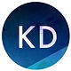 KD letters in white on a dark blue abstract circular logo.