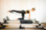 Woman doing diagonal stabilization with strap
