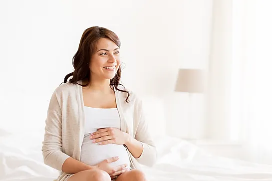 Smiling Pregnant Woman_edited.webp