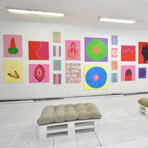 Preparing artworks for an exhibition.