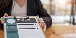 businesswoman-submits-resume-employer-to-review-jo-2022-10-13-19-02-02-utc.jpg