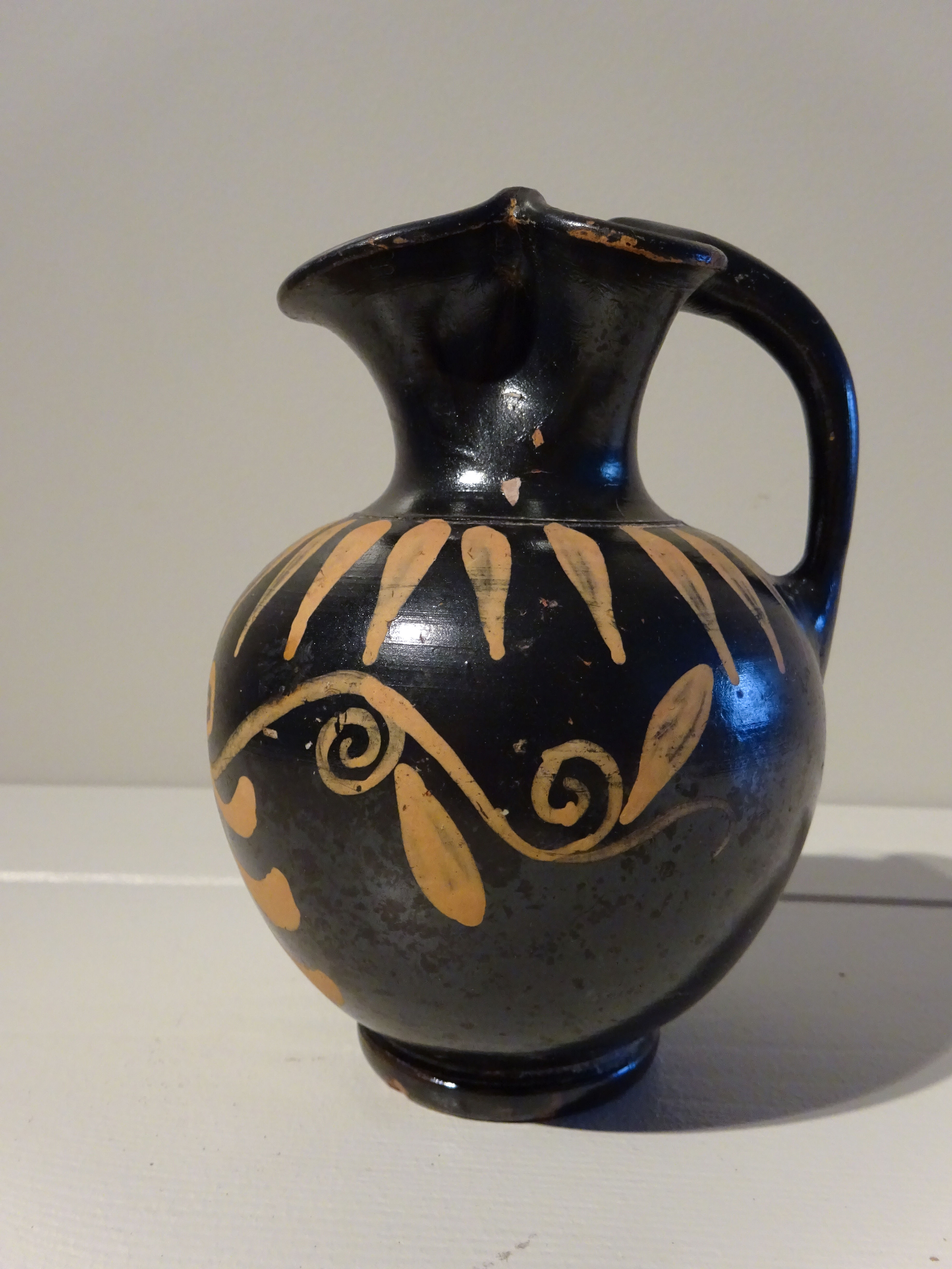 Xenon Oenochoe adorned with palmettes