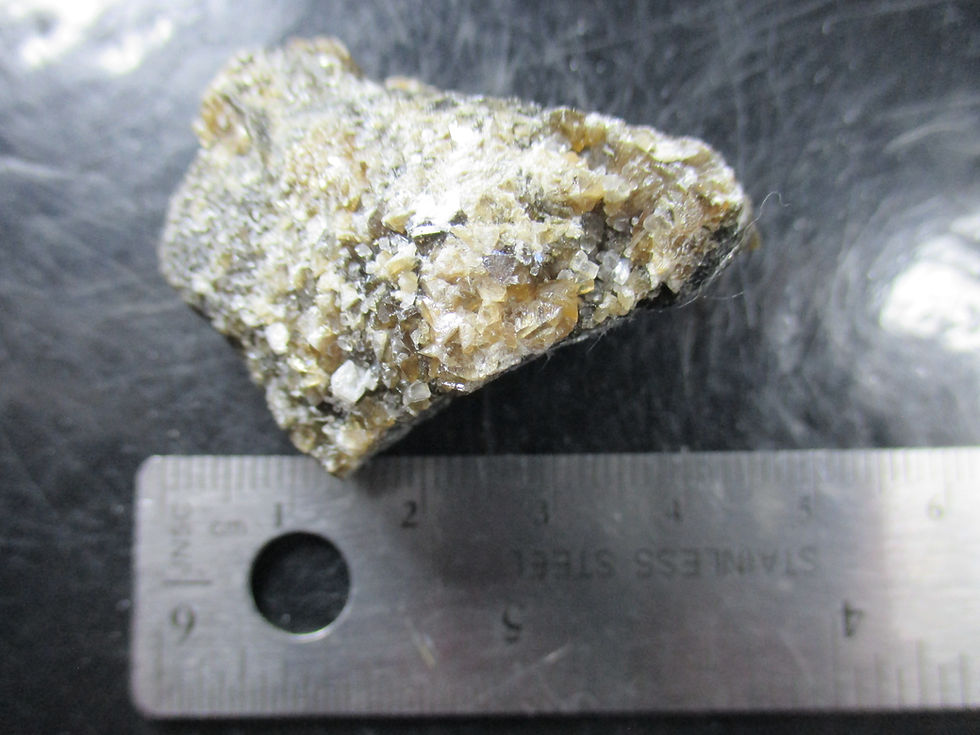Miniature : Calcite brune, Pic Construction