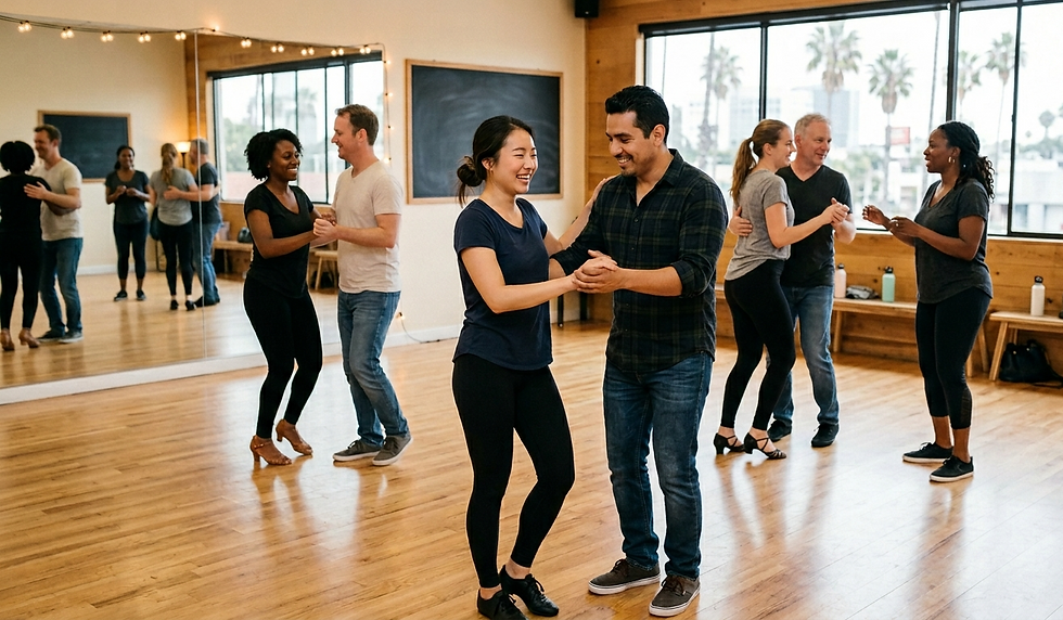Beginner salsa and bachata students smiling in a welcoming dance class, learning easy steps and building confidence without fear of being judged by others.