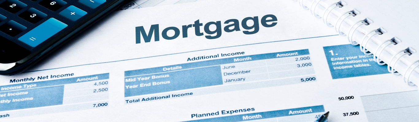 hands shaking over mortgage loan contract