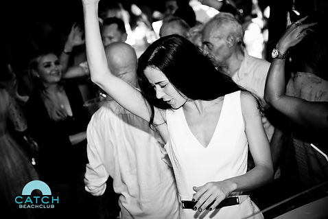 People dancing to the DJs music