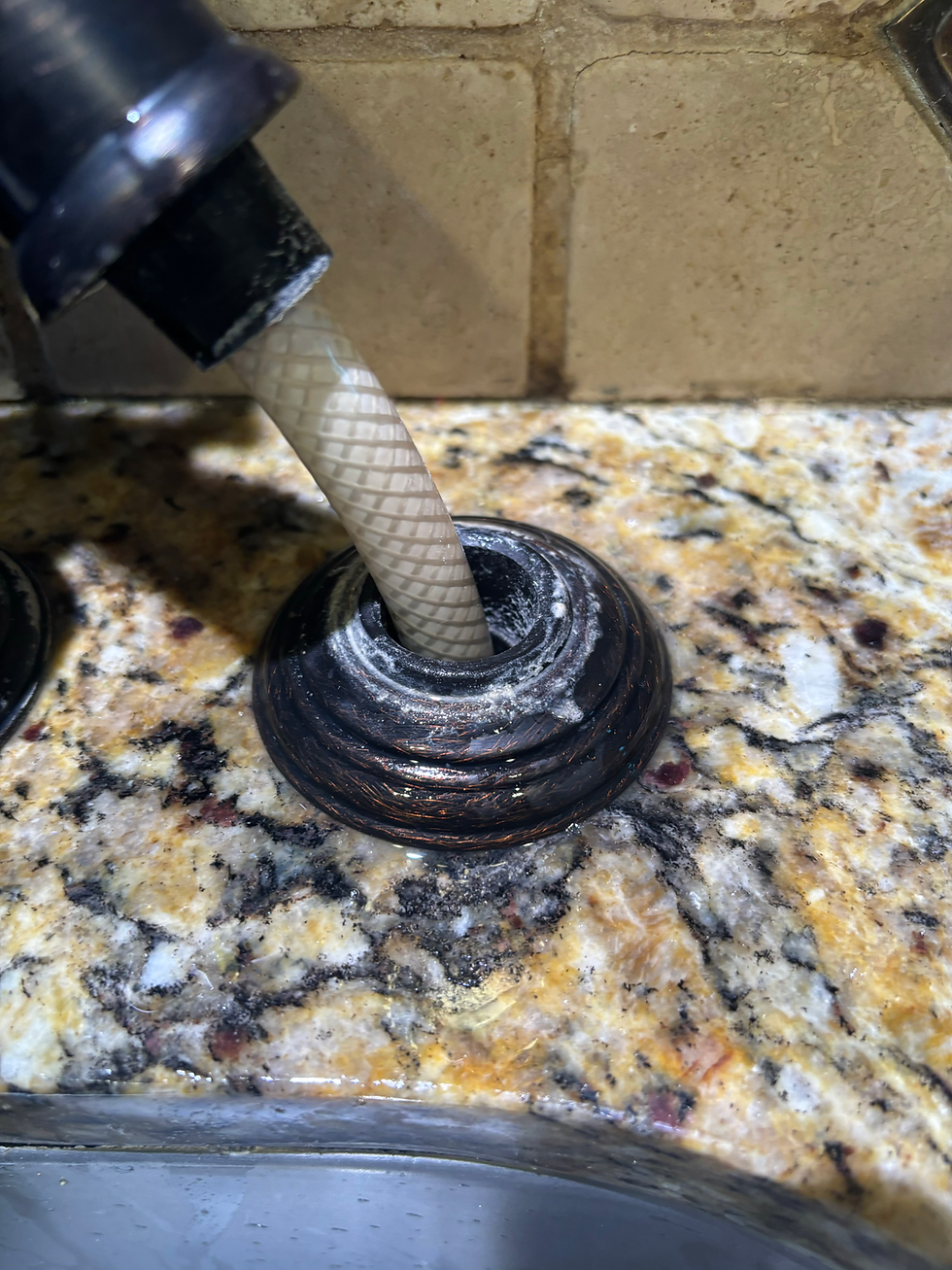 hard water stain on a lewisville kitchen faucet that was eventually cleaned by our professional cleaners
