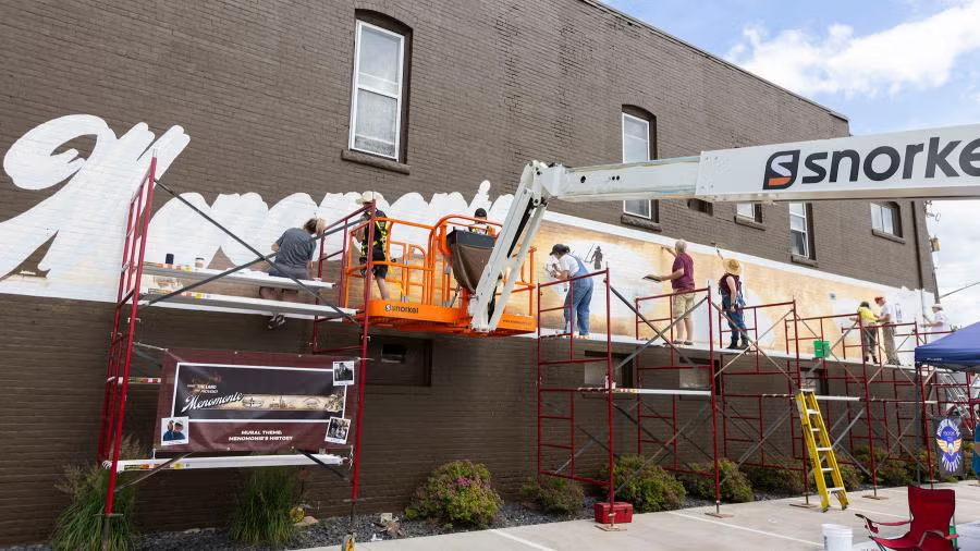 UW-Stout Polytechnic students, staff help turn community into a canvas during Murals in Menomonie