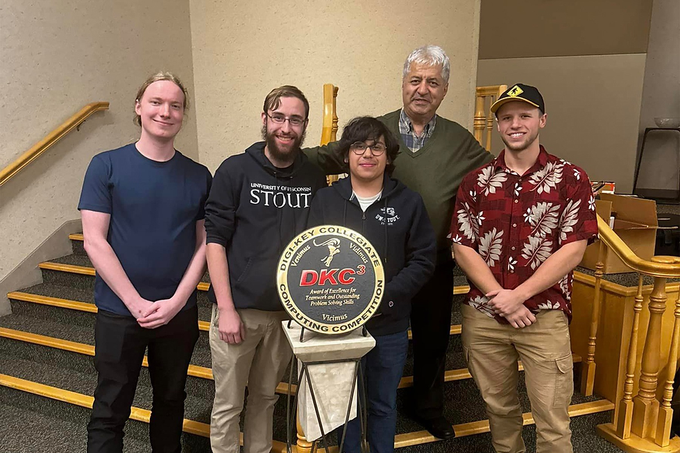 AI Student Club members Steven Kronmiller, Corey Hedlund, Jack Lonn, Michael Witt and Professor Ahmet Turkmen at the DigiKey competition. Photo contributed by Ahmet Turkmen.