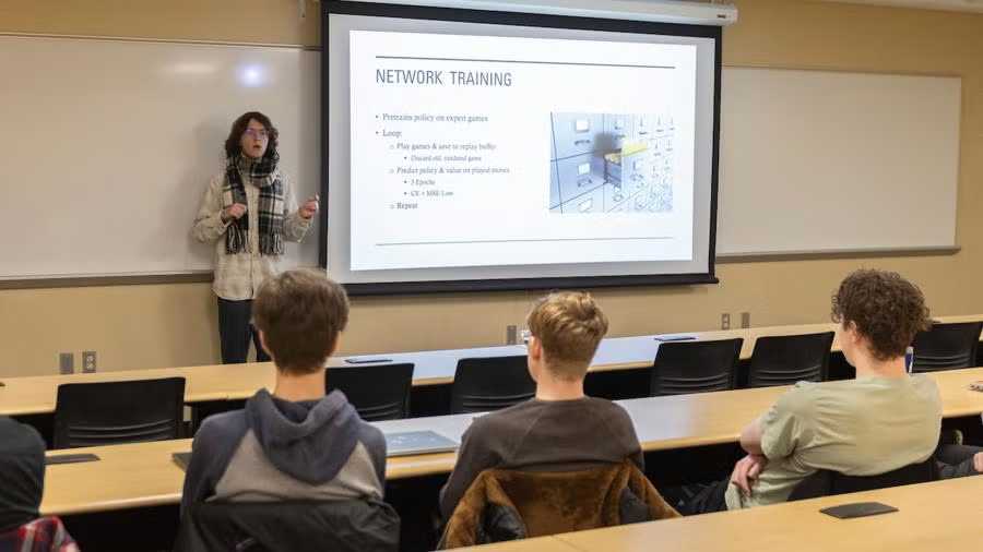 Nathan LaCrosse presents on the group Othello AI project.