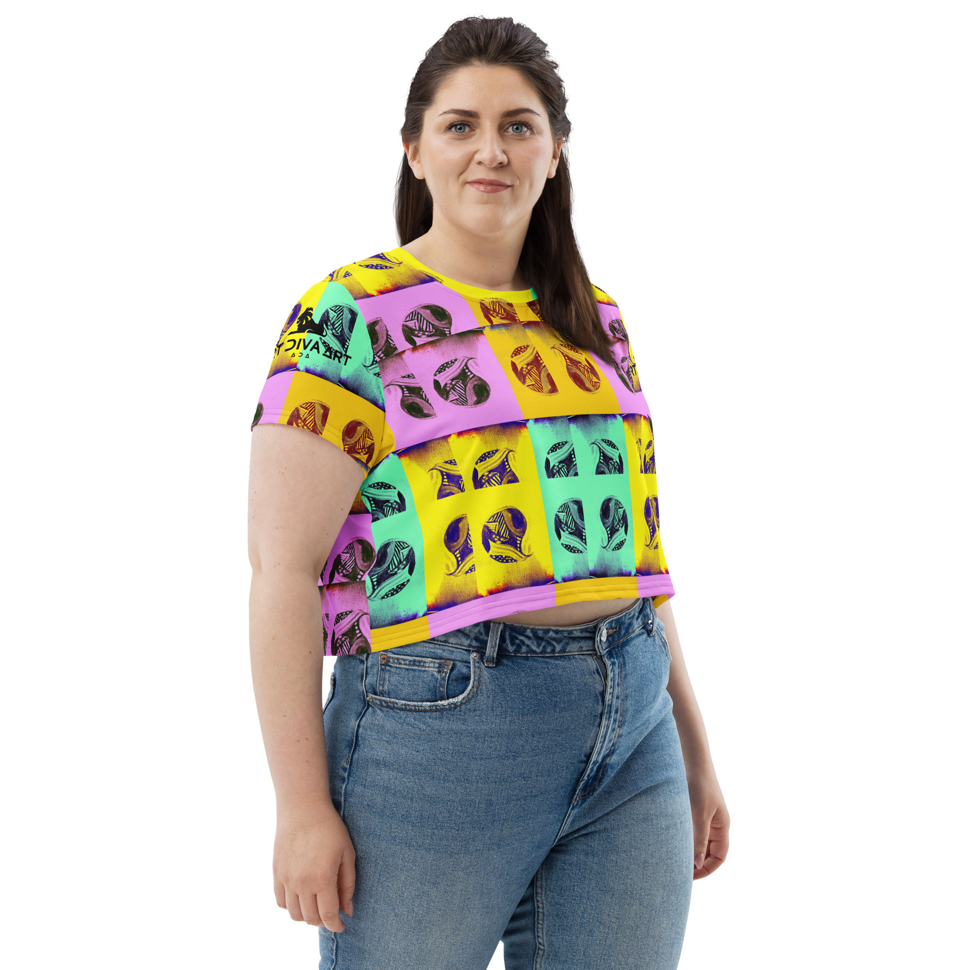 Woman wearing Peeking Twin Ball - Crop Tee and blue jeans, smiling at camera. ArtDivaArt