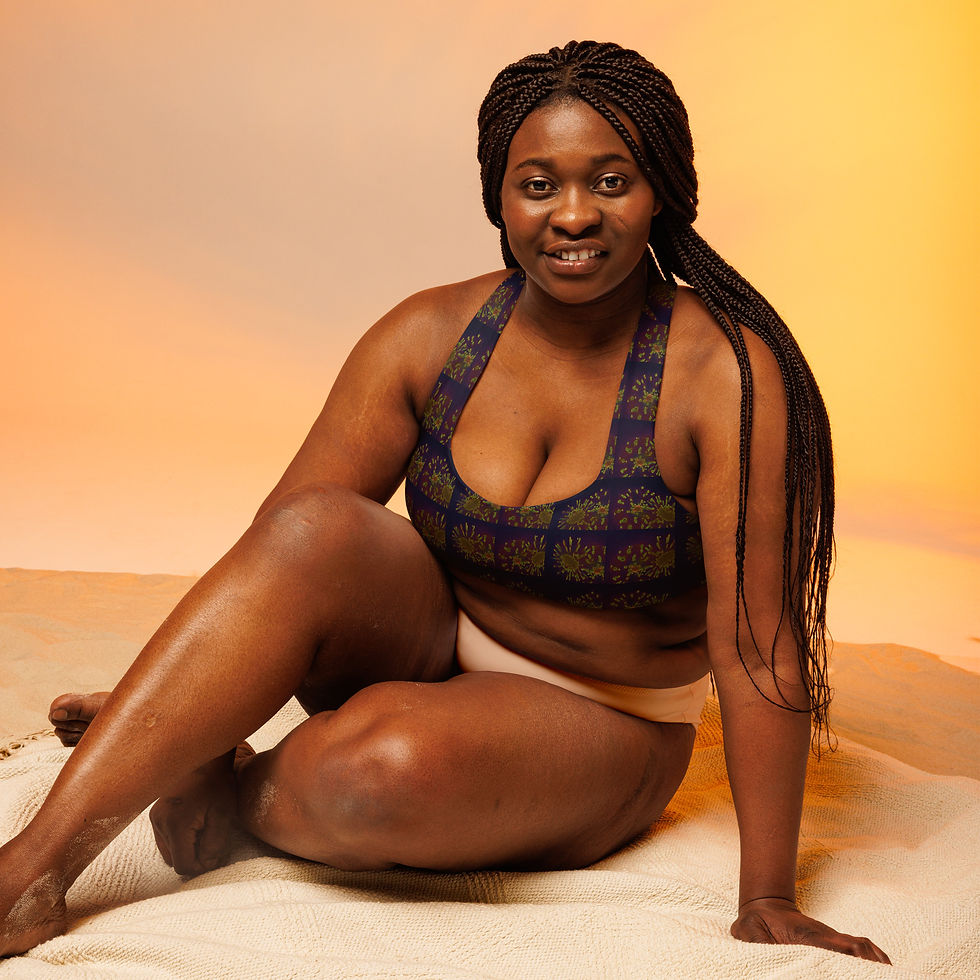 Thumbnail: Smiling woman poses in a sports bra, ArtDivaArt, background of yellow and orange gradients.