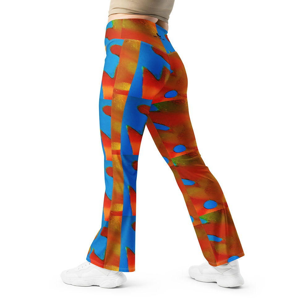 Thumbnail: Woman wearing colorful geometric pattern leggings and white sneakers in studio shot.