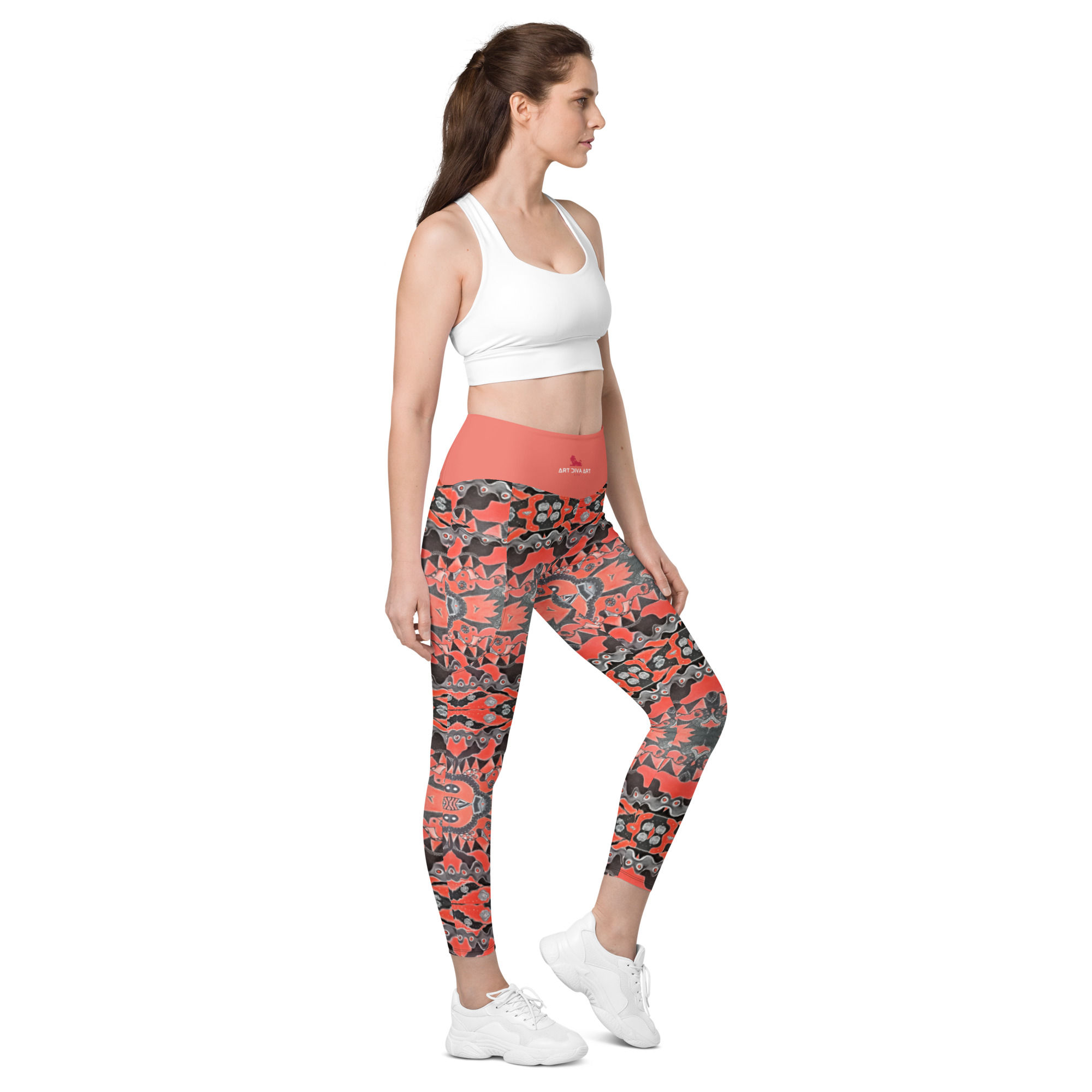 Woman wearing white sports bra and colorful leggings, SYMBOL I - Longline Sports Bra. ArtDivaArt