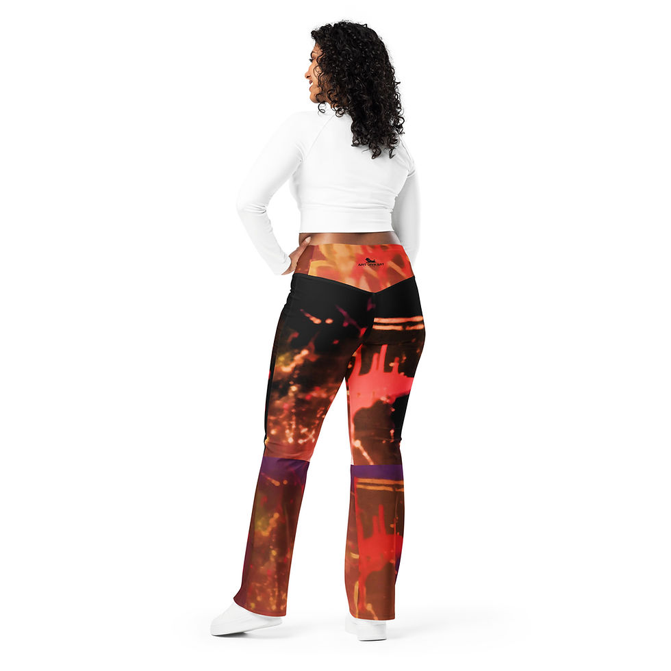 Thumbnail: Woman wearing white top and vibrant orange pants; ArtDivaArt design, standing.