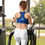 Thumbnail: Woman wearing blue sports bra exercises on elliptical trainer, Tina Flowers 2 - Sports bra.